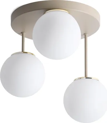 A three-light ceiling lamp with white globe shades and a beige and gold fixture, presented on a white background.