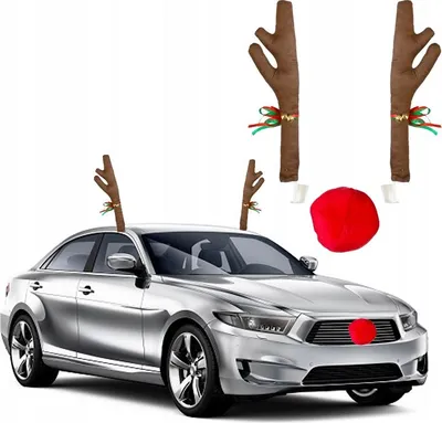 A silver car decorated with reindeer antlers and a red nose for Christmas.