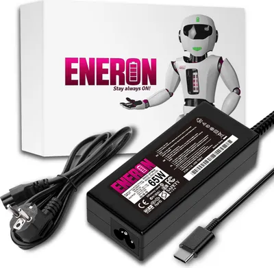 A laptop charger and its power cord are displayed on a white background, with a box and a robot graphic in the background.