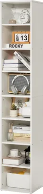 A tall, white, multi-shelf bookcase filled with various decorative items and books.
