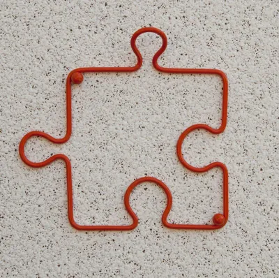 Produktbild von Designer Kleiderhaken "Puzzle" 20 cm Garderobe Wandhaken Haken aus Metall / Farbe: Orange