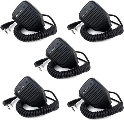 A collage of five identical black microphones with coiled cords and plugs, arranged in a grid pattern against a white background.