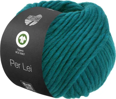 A ball of teal yarn with a black label wrapped around it.