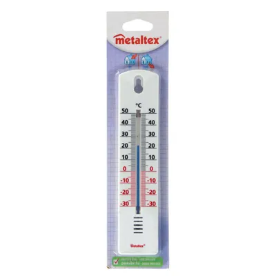 A thermometer is displayed in its retail packaging.
