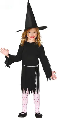 A young girl dressed as a witch for Halloween.