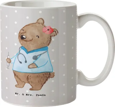 Produktbild von Mr. & Mrs. Panda Kaffeetasse Krankenpflegehelferin Herz - Grau Pastell - Geschenk, Pflegekraft, Pflegehelferin, kaffeebecher bedruckt, Keramiktasse, Teetasse, Tasse