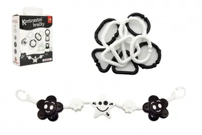 A product shot of baby toys, including a box of contrasting rings and a string of hanging toys.