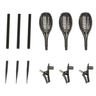 A set of solar torches and accessories laid out on a white background.