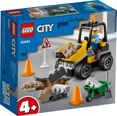 A LEGO City construction set box featuring a front loader, construction worker, and various building elements.