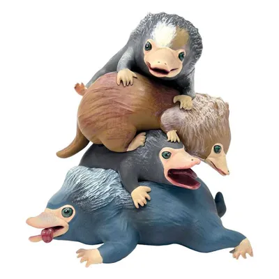 A stack of four Niffler figures from Fantastic Beasts.
