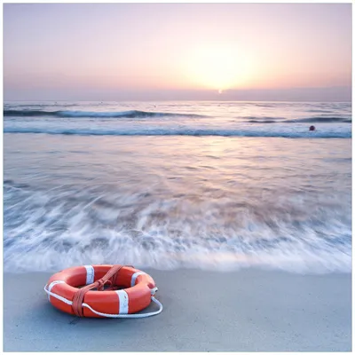 Produktbild von Wallario Möbeldesign / Aufkleber, geeignet für Ikea Lack Tisch - Rettungsring am Strand bei Sonnenuntergang in 55 x 55 cm