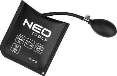 A black air wedge with a bulb pump and metal valve, with text and specifications printed on it.
