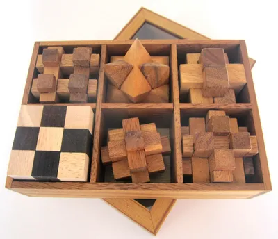 Zdjęcie produktu dla Gry logiczne w zestawie - 6 drewnianych puzzli w pudełku upominkowym