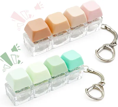 Imagen del producto de Juguetes antiestrés: Set de 2 unidades. Incluye: teclado de descompresión, clicker antiestrés, cuatro botones y teclas de colores