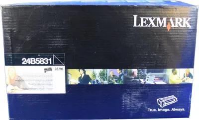 A Lexmark toner cartridge box with product information and images of people working.