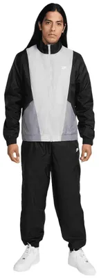 Produktbild von Nike Club Woven Trainingsanzug Herren