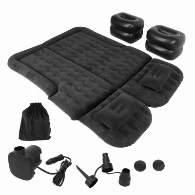 A black inflatable car mattress and accessories are laid out on a white background.