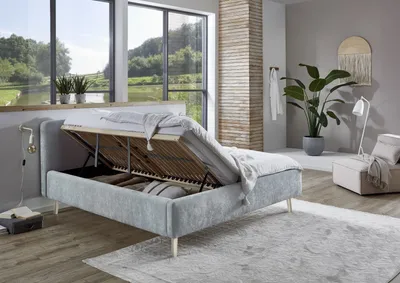 Produktbild von Meise Möbel Stauraumbett Mattis 180x200 cm | Doppelbett | Bettkasten & Lattenrost (Federholzrahmen) | Strukturstoff Hellblau | Holzfuß sandfarbig