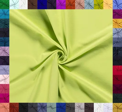 Locker drapiertes, elastisches Baumwoll-Jersey-Gewebe in Gelbgrün, 8 % Elasthan, Öko-Tex Klasse 1, Meterware für Bekleidung.