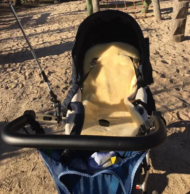 Produktbild von Kinderwagen Einlage KIWA de Luxe echtes Merino Lammfell
