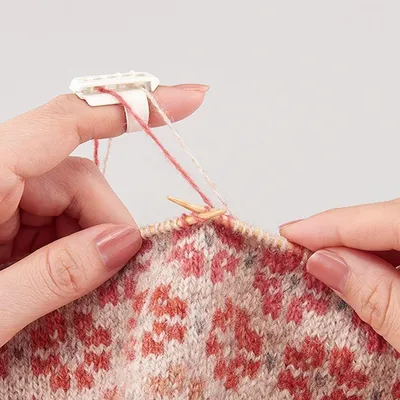 Produktbild von Clover Strickfingerhut Größe S/M