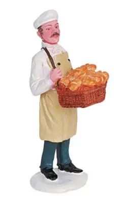 Figur stellt einen Bäcker dar, der stolz einen Korb voller frisch gebackener Brote trägt.