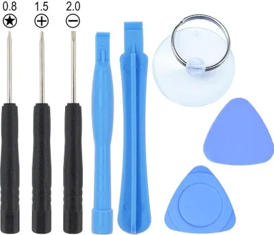 A set of electronic repair tools, including screwdrivers, spudgers, and picks, arranged on a white background.