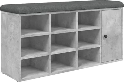 A shoe bench with multiple compartments and a single door on the right side, with a dark gray upholstered top.