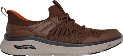 A side view of a single brown athletic shoe.