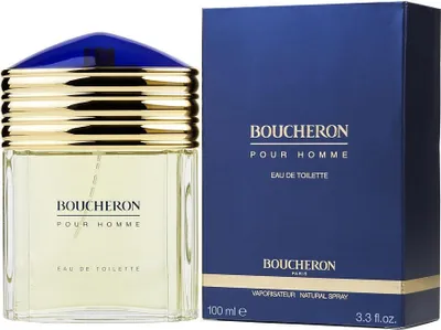 A bottle of Boucheron Pour Homme Eau de Toilette and its packaging are displayed side-by-side against a white background.