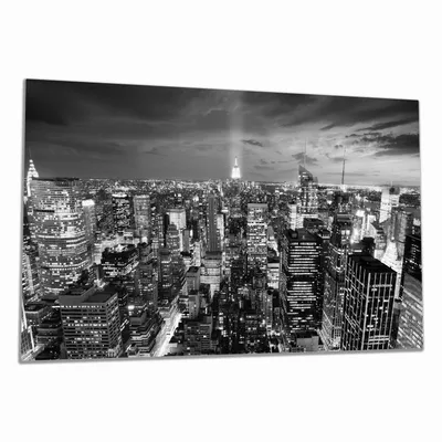 Produktbild von Wallario Herdabdeckplatte aus Glas, Größe 80 x 52 cm 1-teilig, Motiv New York bei Nacht - Panoramablick über die Stadt - schwarzweiß