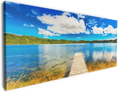 Produktbild von Wallario Premium Leinwandbild Klarer See mit Steg - Blauer Himmel in Größe 80 x 200 cm