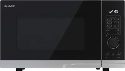 A front view of a SHARP microwave oven on a white background.