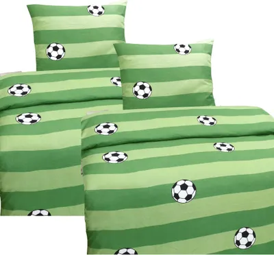 A set of bedding with a green striped pattern and soccer ball graphics.