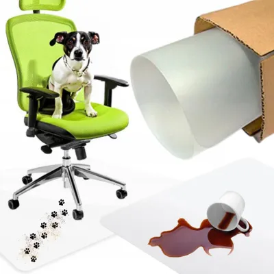 A dog sits on a green office chair, which is placed on a transparent floor mat. A roll of the floor mat is shown in a cardboard box, and a spilled cup of coffee is on another mat.