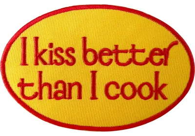 Aufnäher „I Kiss Better Than I Cook“ 9x5,9 cm Orange
