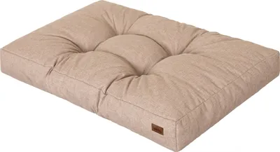 A dog mattress on a white background.