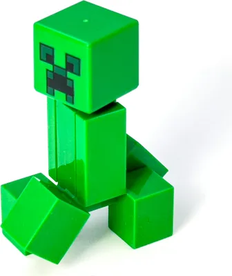 A green Minecraft Creeper toy figure is shown against a white background.
