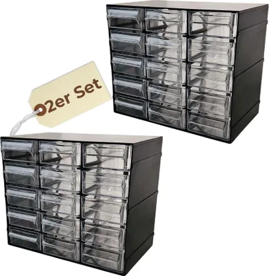 Two black plastic storage boxes with clear drawers are shown against a white background. A beige tag with the text "2er Set" is attached to the front of the upper box.