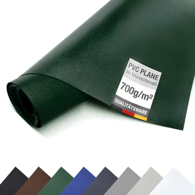 A rolled-up piece of dark green PVC tarpaulin is shown diagonally against a white background. A label is attached to the tarpaulin.