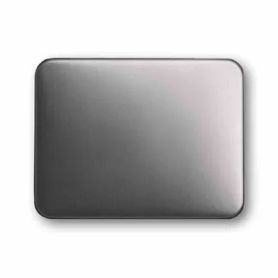 A close-up, top-down view of a rectangular object with rounded corners, likely a component or cover, against a white background.