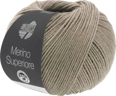 A ball of taupe-colored yarn with a label.