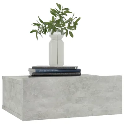 A floating bedside table with books and a vase of plants on top, against a white background.
