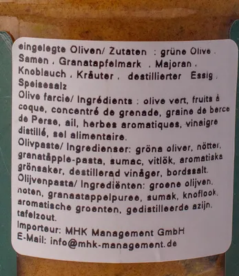 Produktbild von SPINO- Eingelegte Oliven in Granatapfelmark 680gr.