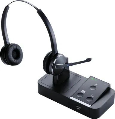 A Jabra Pro 9450 stereo headset with its charging station, presented against a white background.