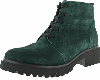 A single green suede lace-up boot with a black sole is shown against a white background.