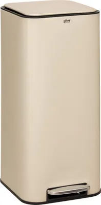 A standalone beige pedal bin.