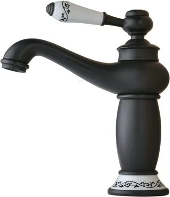 A close-up studio shot of a black faucet with a white decorative handle.