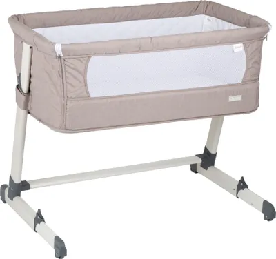 A baby bedside crib on a white background.