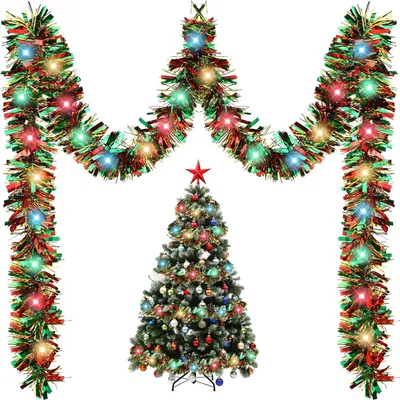 A decorated Christmas tree with garlands and lights.